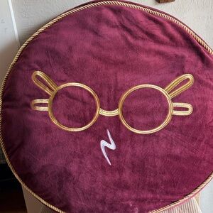 Elegant Burgundy Pillow with Gold Accents